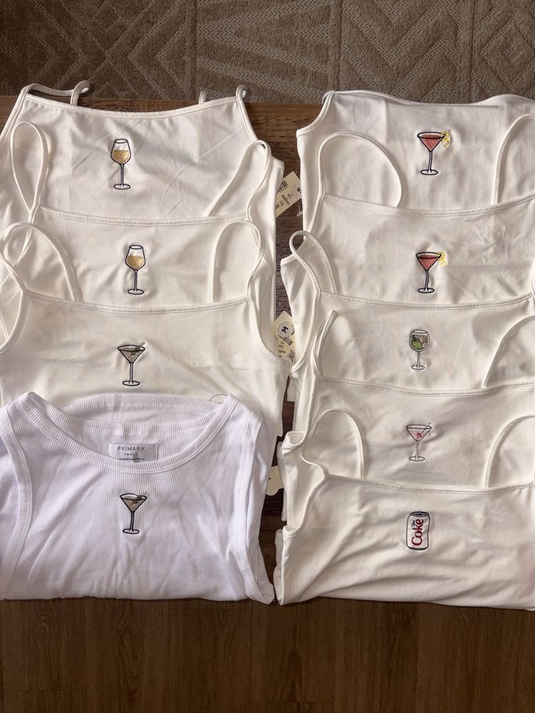Ribbed cotton tanks with hand-drawn cocktail icons, a girls' trip favorite